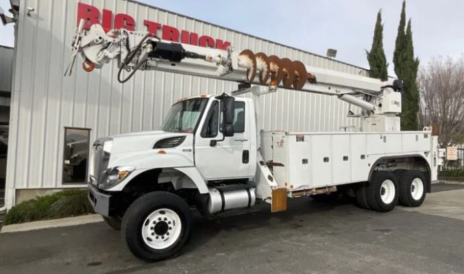 White Digger Derrick Truck