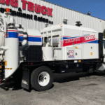 A 2020 International MV607 Vacmasters System 5000 Vacuum Truck