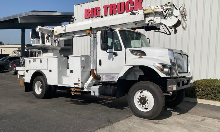 A 2016 International 7300 4x4 Altec DM47B TR Digger Derrick by Big Truck & Equipment Sales