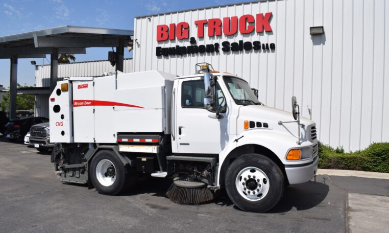 A 2008 Sterling Acterra Elgin Broom Bear CNG Mechanical Street Sweeper by Big Truck & Equipment Sales