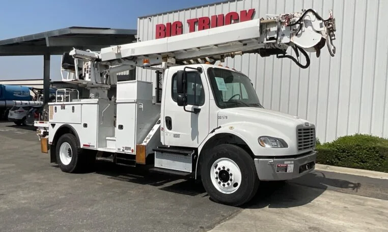 2014 Freightliner M2 Altec DM47BTR digger derrick - a dependable used option for budget-friendly digging and utility operations.