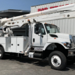 A 2016 International 7300 4x4 Altec AA55 60' Bucket Truck by Big Truck & Equipment Sales