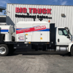 A 2020 International MV607 Vacmasters System 5000 Vacuum Truck by Big Truck & Equipment Sales