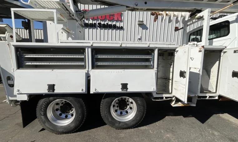 operation panels at the side of a digger derrick truck