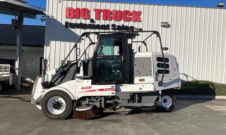 A 2019 Elgin Pelican CNG Street Sweeper by Big Truck & Equipment Sale