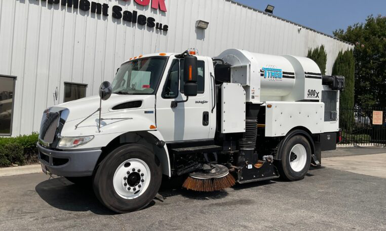 A 2014 International 4300 Tymco 500X Street Sweeper by Big Truck & Equipment Sales