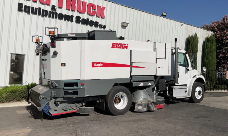 Second 2017 Freightliner M2 Elgin Eagle waterless sweeper at work.