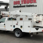 a white 2015 Ford F550 Altec AT40G 45' Bucket Truck