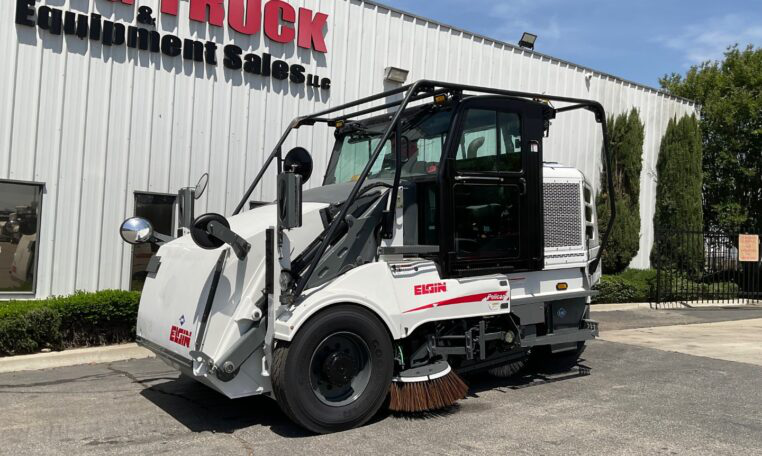 A 2019 Elgin Pelican CNG Street Sweeper by Big Truck & Equipment Sales