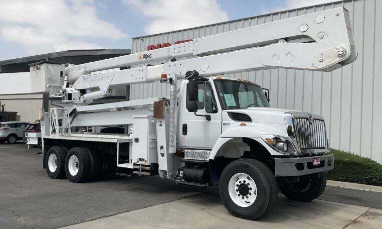A 2015 International 7400 6x6 Altec A77T-E93 98' Bucket Truck by Big Truck & Equipment Sales